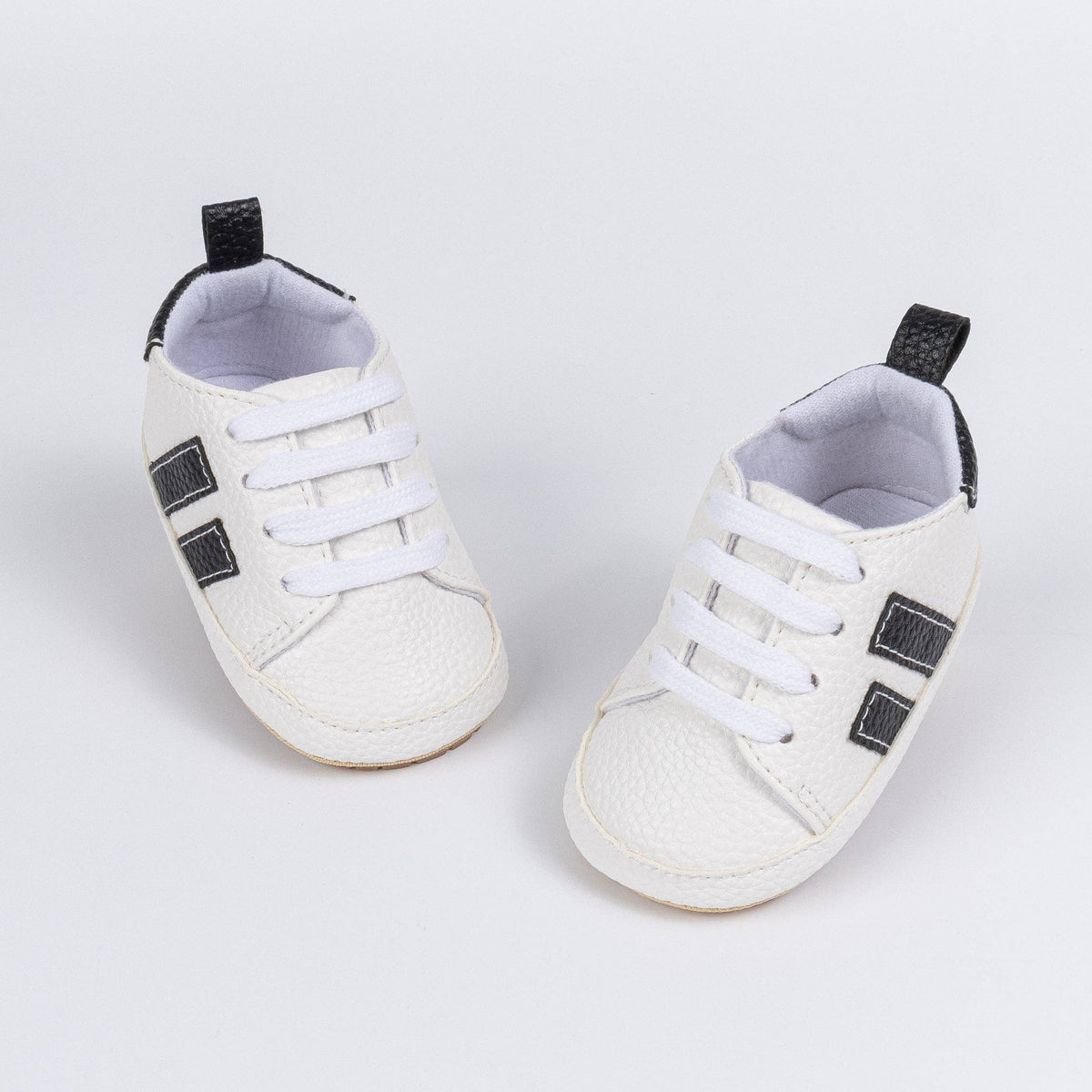 Unisex pleather baby tennis, super cute.